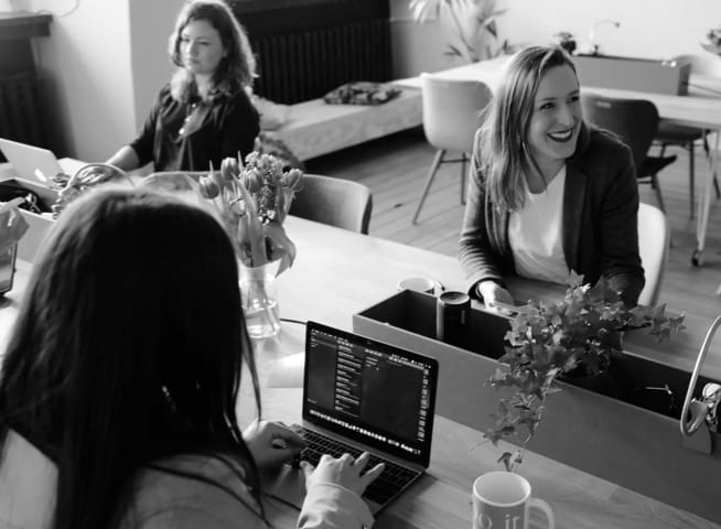 ladys laughing at the office